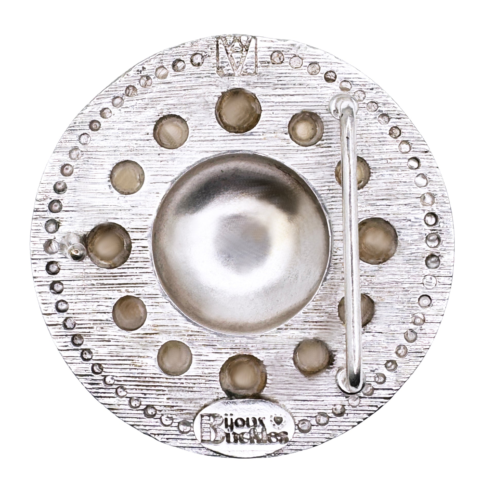 BACK OF ROUND SILVER BELT BUCKLE WITH PEARL ACCENTS