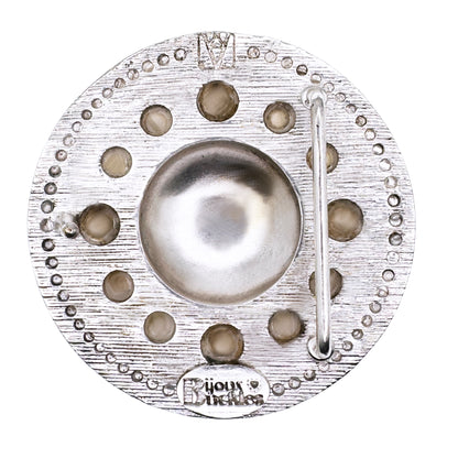 BACK OF ROUND SILVER BELT BUCKLE WITH PEARL ACCENTS