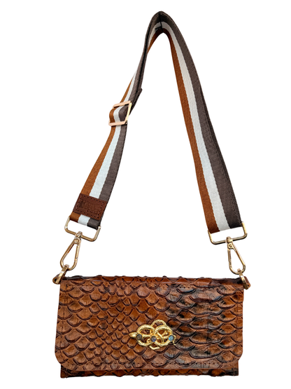 Brown textured handbag with a decorative snake clasp on a white background